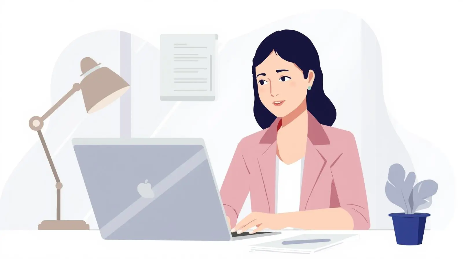 Businesswoman using laptop at desk